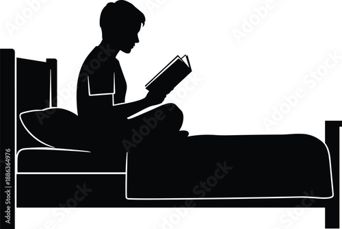 Silhouette of a young boy sitting on a bed and reading a book, peaceful evening study, childhood education and literacy concept