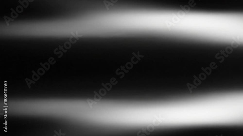 Cinematic Monochrome Gradient Texture with Subtle Film Grain Noise and Atmospheric Slow Motion Visuals for Abstract Minimalist Background Design in High Definition 4K Resolution