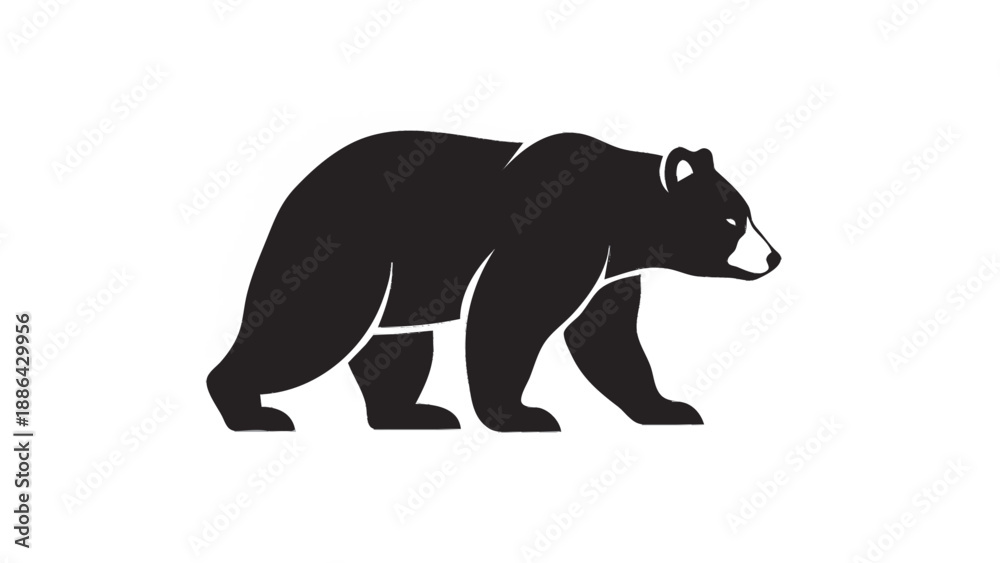 Fototapeta premium Silhouette of a black bear walking from left to right.