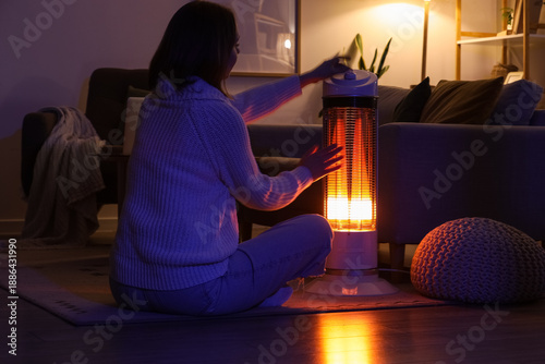 Young woman adjusting moder...