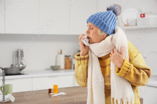 Sick elderly woman with tis...