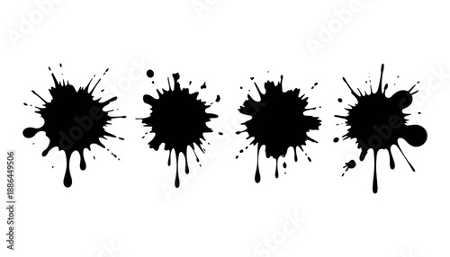 Four black ink splatters on white background ink drops 