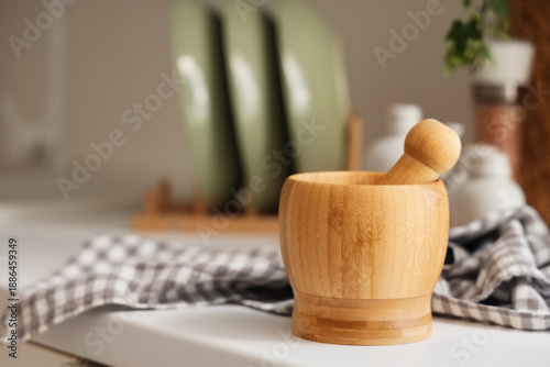 Wooden mortar with pestle o...
