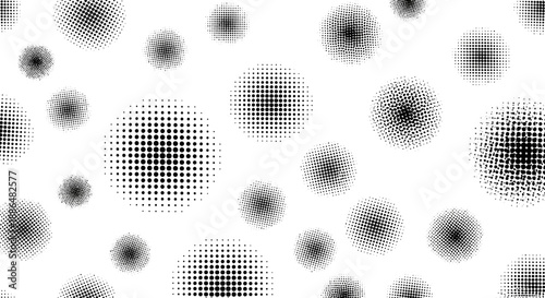 A seamless pattern of black and white halftone dots forming circular shapes of varying sizes and densities.