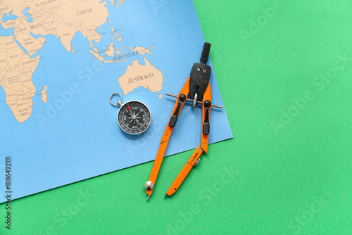 Modern compass, world map a...