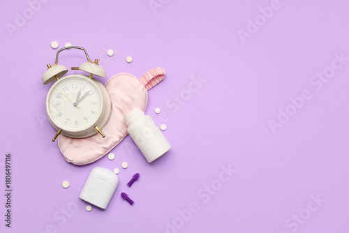 Alarm clock with sleeping m...