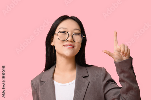 Beautiful young Asian woman...