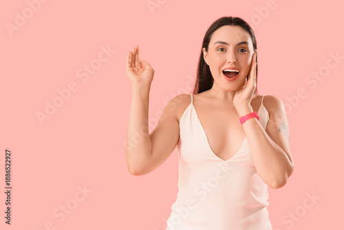 Surprised young woman with ...