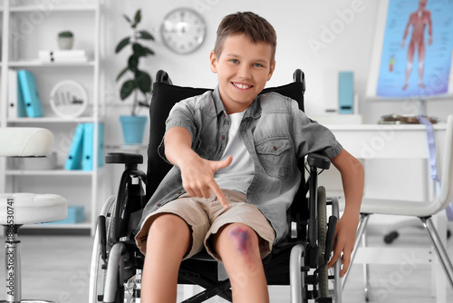 Little boy with injured leg...