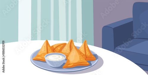 Plate of golden fried samosas with a dipping sauce on a table next to a blue couch