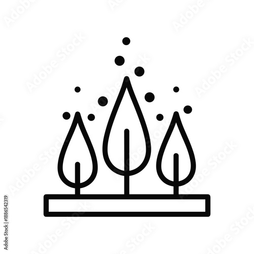 Incense sticks burning on burner