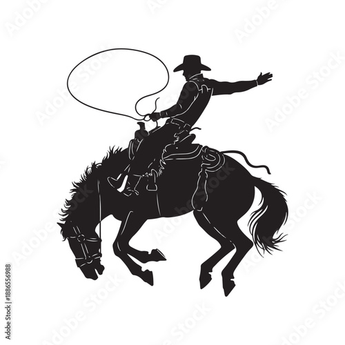 Cowboy riding horse and lassoing with rope
