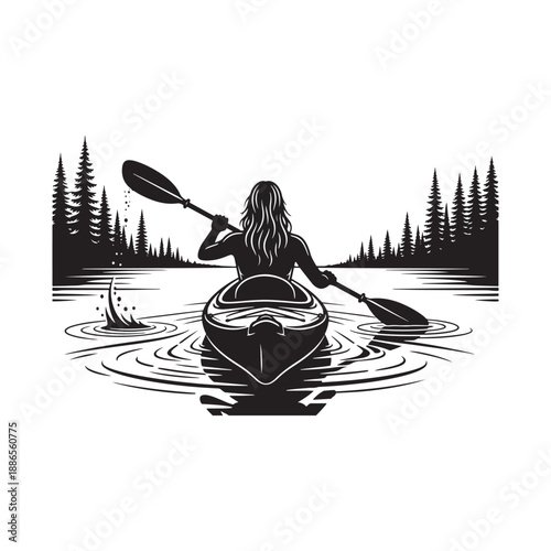 Woman paddling kayak through serene lake