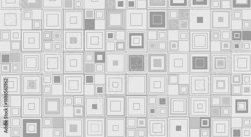Geometric pattern of various gray squares and rectangles arranged in a grid, showcasing different sizes, shades, and layering