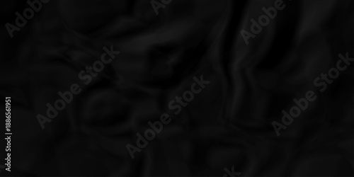 Crumpled black paper billboard closeup ripped wrinkle litter canvas page vintage texture background.