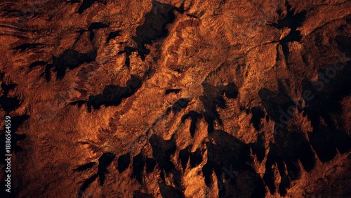 Billede på lærred The scene captures an expansive view of a rugged landscape bathed in warm golden light during sunset