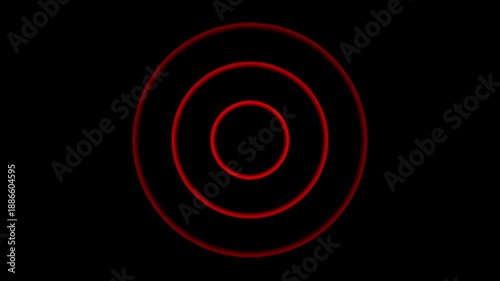 Concentric red circles with glowing effect on black