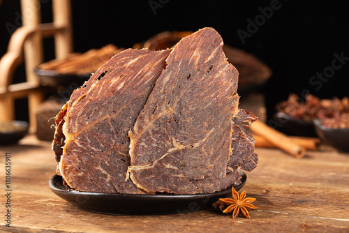 Dried beef crisps, beef crisps on a wooden background