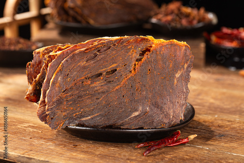 Dried beef crisps, beef crisps on a wooden background
