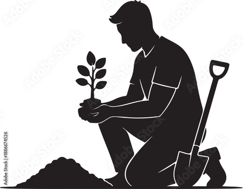 Silhouette of a man planting a sapling in the soil with a shovel