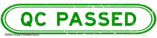 Grunge green QC passed word rubber seal stamp on white background