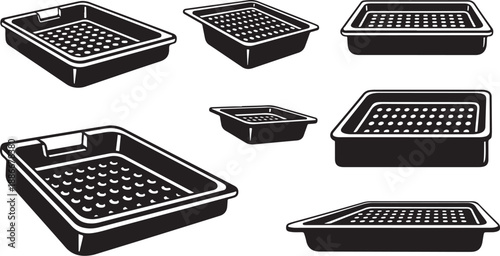 Collection of empty black plastic seed trays for planting