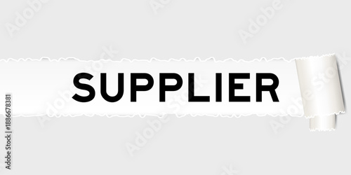 Ripped gray paper background that have word supplier under torn part