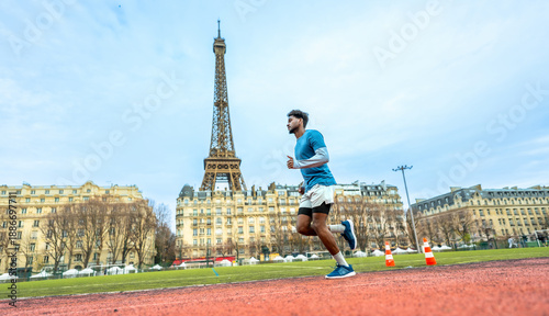 Photography Man running on track in paris with eiffel tower