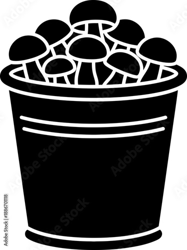 А bucket full of freshly picked wild mushrooms. Harvest fall season concept. Simple flat monochrome vector illustration for design, icon, symbol