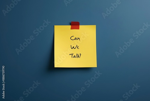 Note stick on blue wall asking CAN WE TALK? - concept of difficult conversation, to approach for having serious talk to solve conflicts or relationship issues