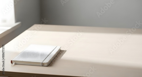 Wallpaper Mural A close up shot shows a man in a white shirt holding a box near an open notebook and a stack of paper documents in an office Torontodigital.ca