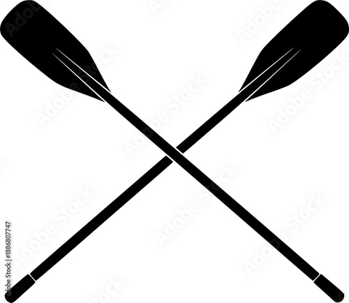 Two crossed oars creating an x shape a striking silhouette
