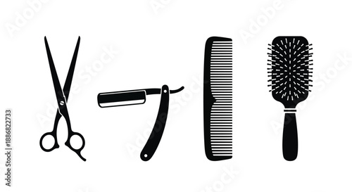 A set of barber tools including scissors, a straight razor, and combs.