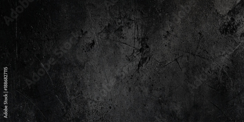 A high contrast moody abstract wall background featuring a dark grey stone surface vignetted edges and atmospheric lighting make it ideal for cinematic posters.