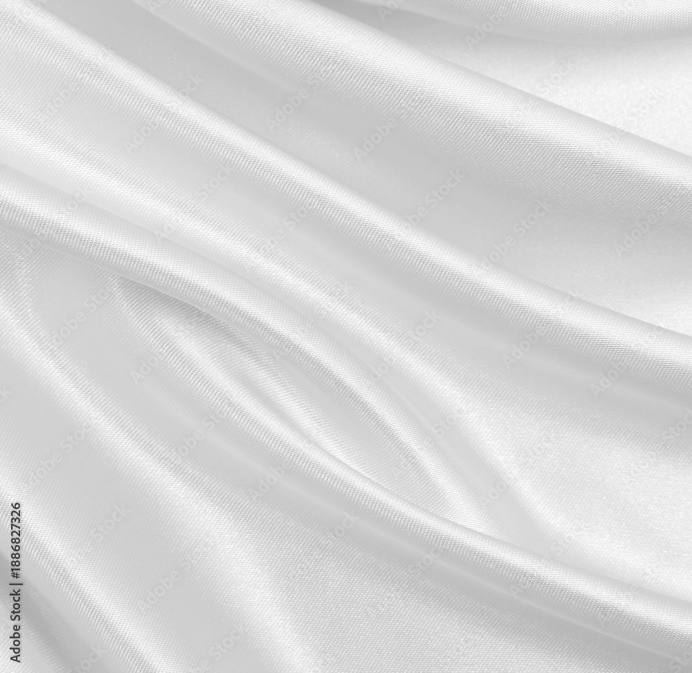 Fototapeta premium Smooth elegant white silk or satin luxury cloth texture as wedding background. Luxurious background design