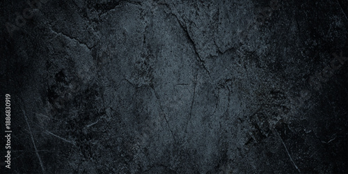 Dramatic dark wall concrete texture with heavy scratches weathered grit deep scratches, scuffs, and a weathered concrete appearance.