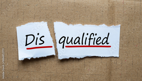 Disqualified Word on Torn Paper Business Concept Rejection and Failure