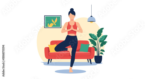 Young woman in athletic wear practicing a yoga tree pose in a cozy living room with a red sofa, indoor plant, and wall painting.