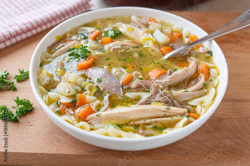 Delicious homemade chicken soup fresh and homemade cooked on a plate