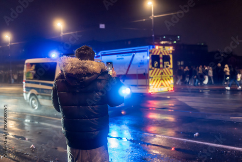 Fotografie During debates over a fireworks ban in Germany, ambulances and police vehicles drive up and down the streets on New Year’s Eve