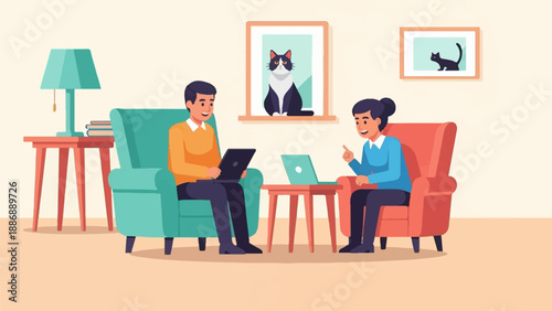 Two people sitting in armchairs with laptops, talking, with cats on the wall