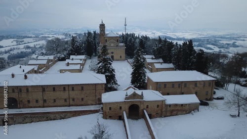 Fano snow in monastery Eremo di Monte Giove with drone 4k