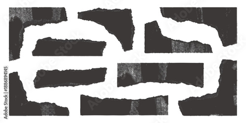Collection of torn black paper pieces with rough edges on white background 