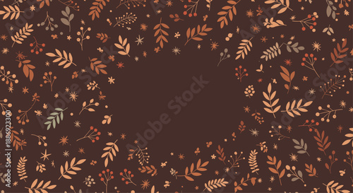 Warm and cozy autumn background with a circular frame made of scattered leaves, berries, and snowflakes in rich, earthy brown and orange tones.
