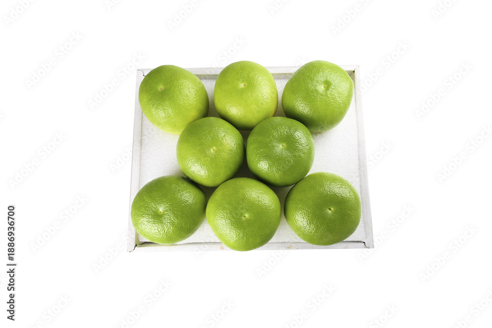 Obraz premium Fresh Green Grapefruits from Taiwan in Shipping Box - Emerald Citrus Fruit Export Shipment