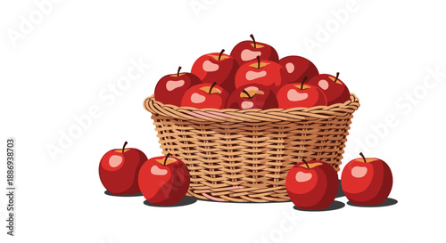Wicker basket overflowing with shiny red apples, with several more apples scattered around it, isolated on a white background.