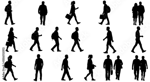 Silhouettes of people walking in various directions with luggage in a busy environment from a distant viewpoint