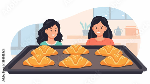 Two smiling females present a tray of freshly baked croissants in a kitchen