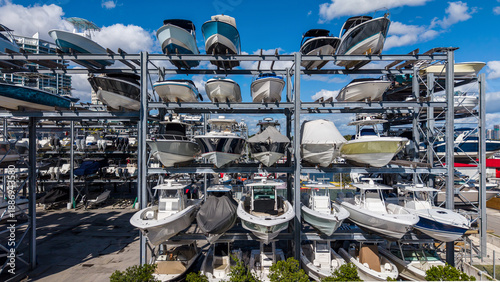 Foto Row of boats sticking out of a boat storage rack in a marina