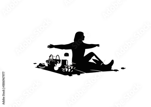 Silhouette of a woman meditating in a serene outdoor setting with picnic items nearby